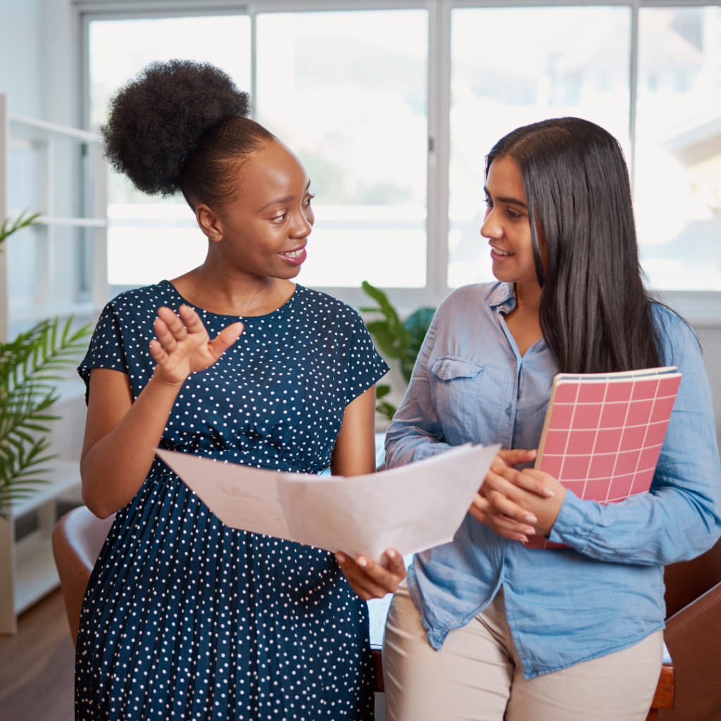 two women in business mentoring one another